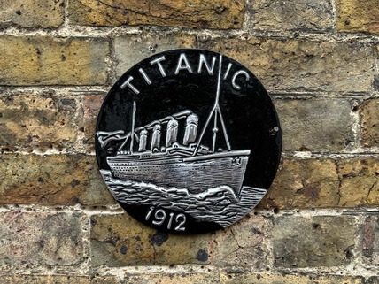 round aluminium Titanic plaque